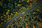 Aerial view of heavy truck on a narrow twisting road