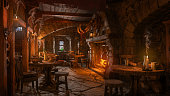 Dark moody medieval tavern inn interior with food and drink on tables, burning open fireplace, candles and daylight through a window. 3D illustration.