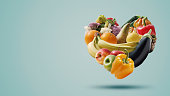 Fruits and vegetables arranged in a heart shape