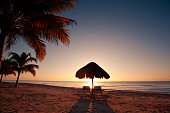 Tropical Beach Sunset in Vacation Resort Hotel of Cancun Mexico