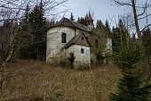 old interesting architecture of a church located in the mountains in autumn