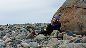 A mature woman by the sea .