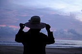 Female tourist relaxing by the sea