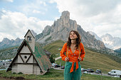 woman  on the background of Passo Giau in Dolomites