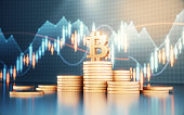 Bitcoin Icon on Metal Coins on Finance Background