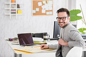 Portrait of a creative office worker at desk