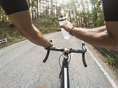 Hydrating on bicycle.