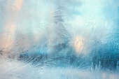 Colorful frosty pattern on the window