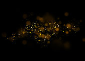 Gold glittering star light and bokeh.Magic dust abstract background element for your product.