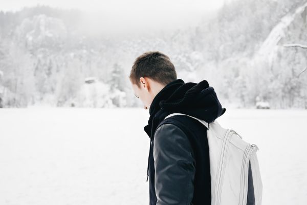 Man in the Middle of Snowy Valley Free Photo