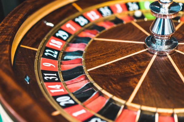 Wooden Roulette Wheel Casino Game Close Up Free Photo