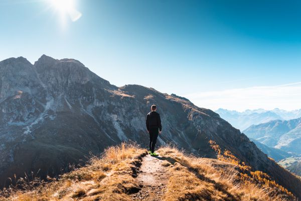 Young Man Climbed The Mountain Top Free Photo